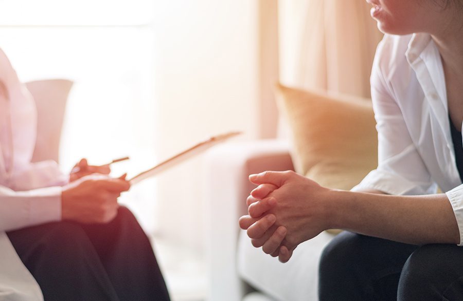 A counselor with a patient.